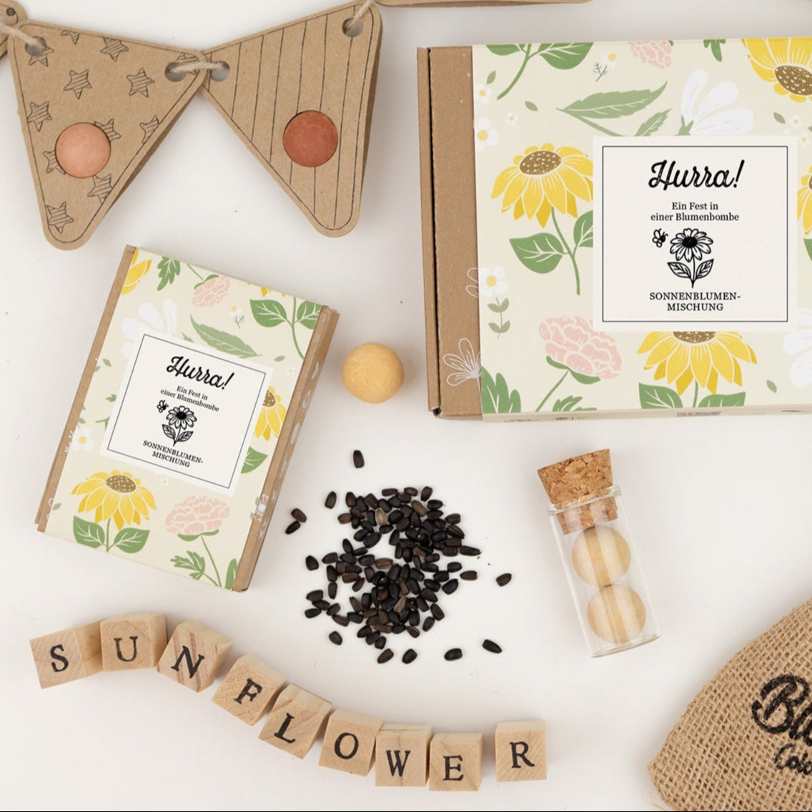 Geschenkbox Mini „Hurra!“ mit 4 Sonnenblumen-Blossombs
